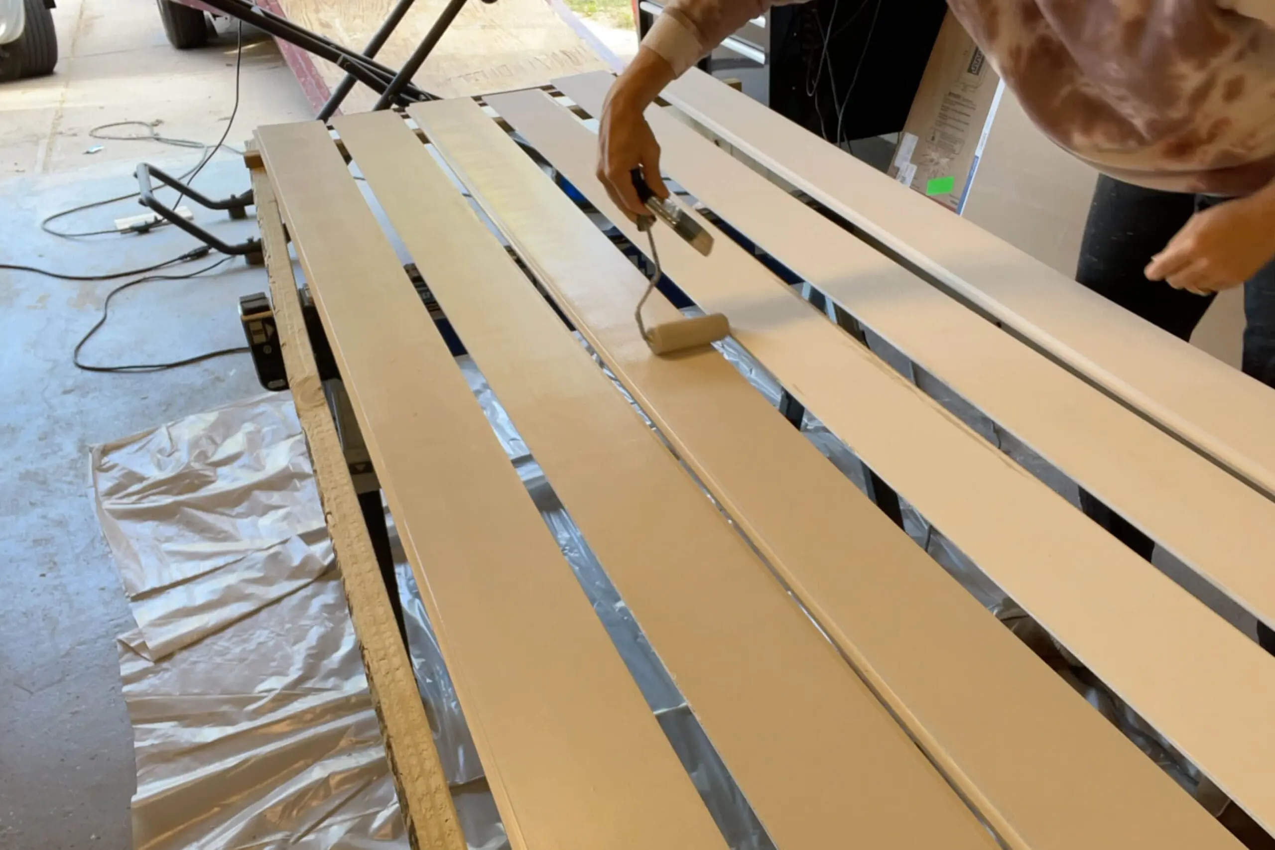 Painting a shiplap backsplash.